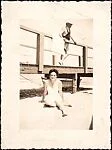 [Peggy Hobson Seated Before Boardwalk]