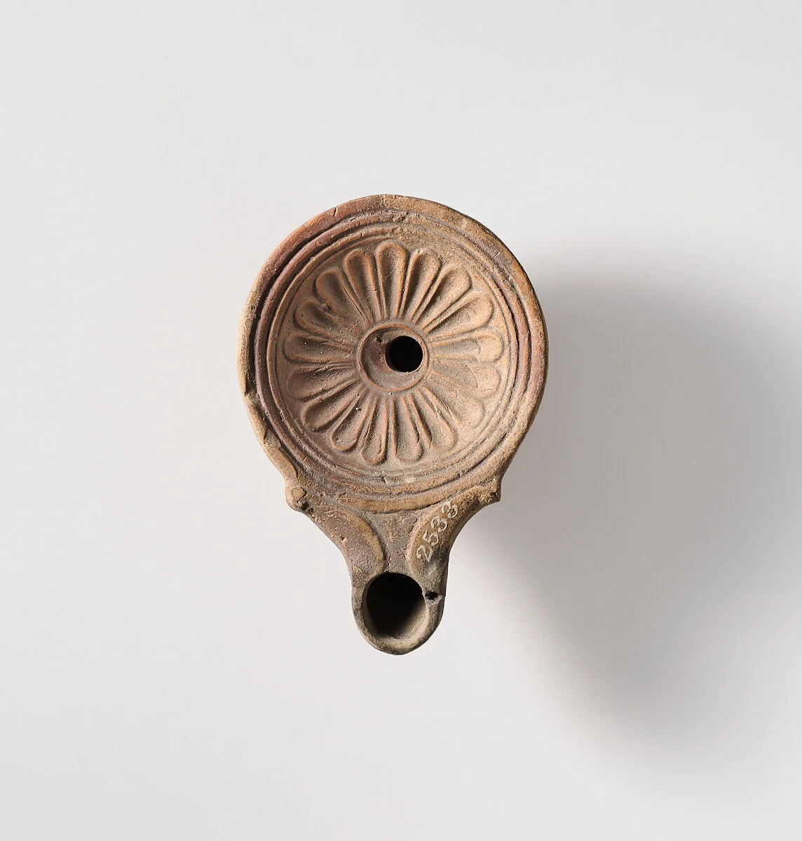 Terracotta oil lamp — Unknown