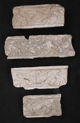 Fragments of a Frieze with Chasing Animals