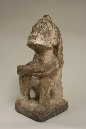 Seated Male Deity (?)