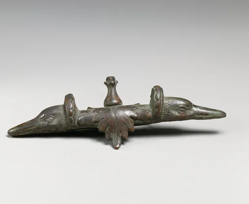 Bronze handle attachment with duck heads