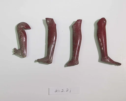 Inlays from shrine: two legs