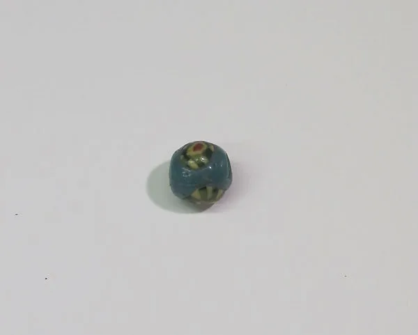 Bead with composite eyes — Unknown