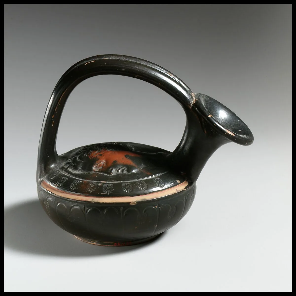 Terracotta askos (flask with a spout and handle over the top) — Unknown