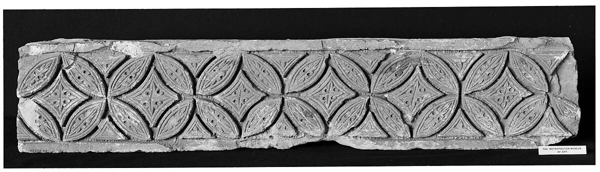 Fragment from a Post or Lintel with Leaves Branching from a Running Vine — Unknown