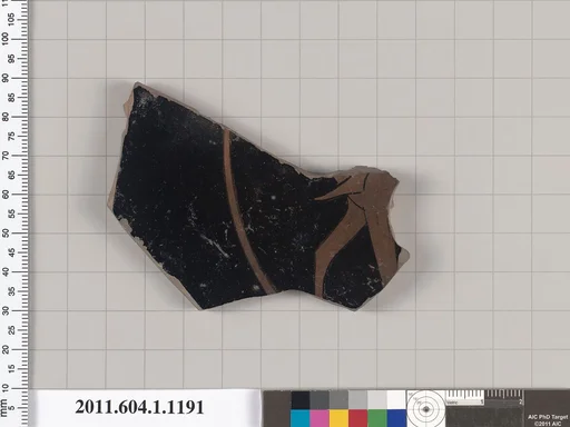 Terracotta fragment of a kylix (drinking cup)