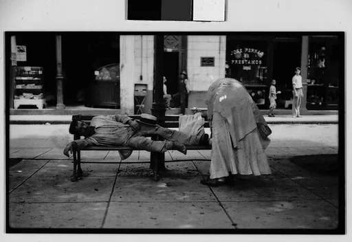[Man Sleeping on Bench in Public Square, Havana]