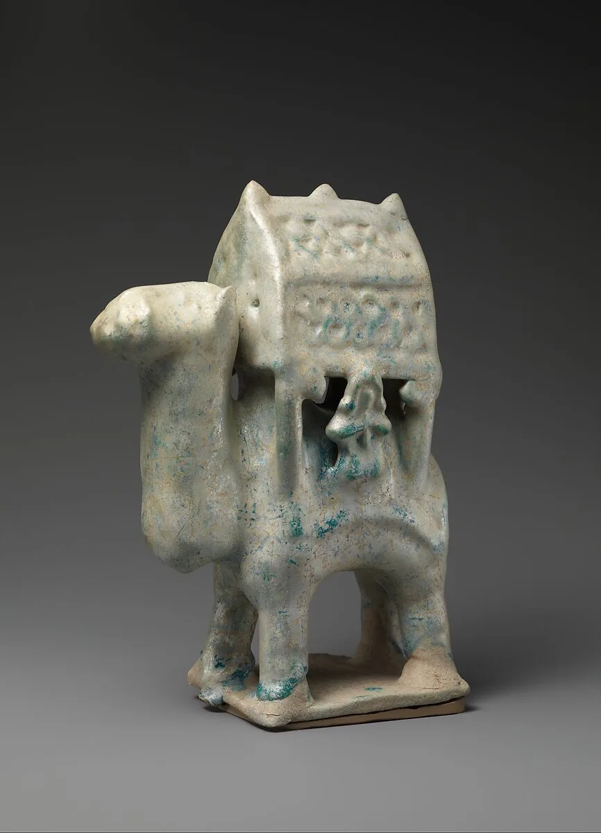 Figurine in the Form of a Camel Carrying a Palanquin and Two Riders — Unknown