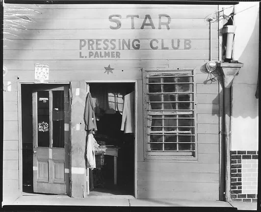 [Shopfront Façade of Star Pressing Club Laundry, Vicksburg, Mississippi]