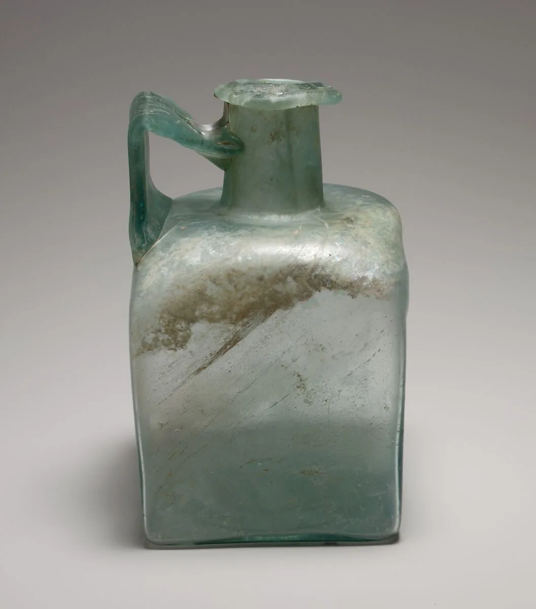 Glass square bottle — Unknown