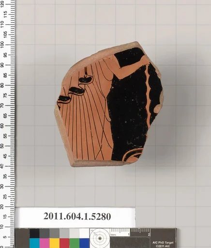 Terracotta fragment of a kylix (drinking cup)