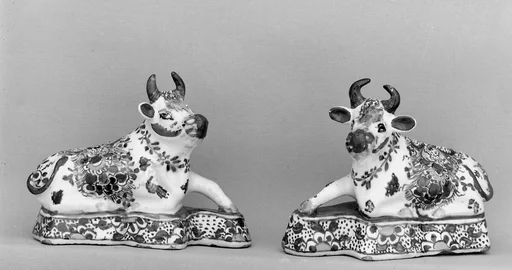 Pair of reclining cows