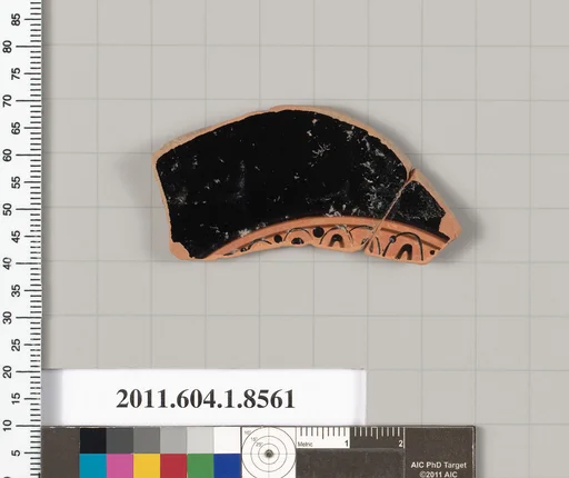 Terracotta fragment of a stemless kylix (drinking cup)