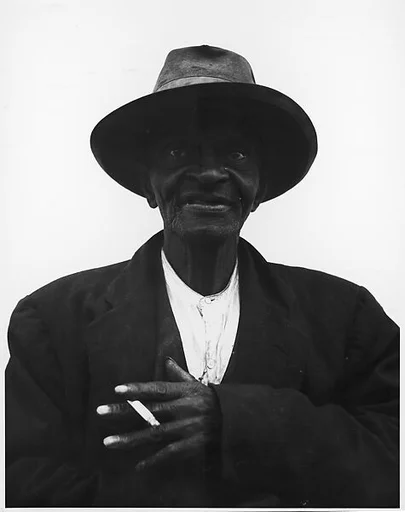 [Georgetown Series: Man Wearing Hat]
