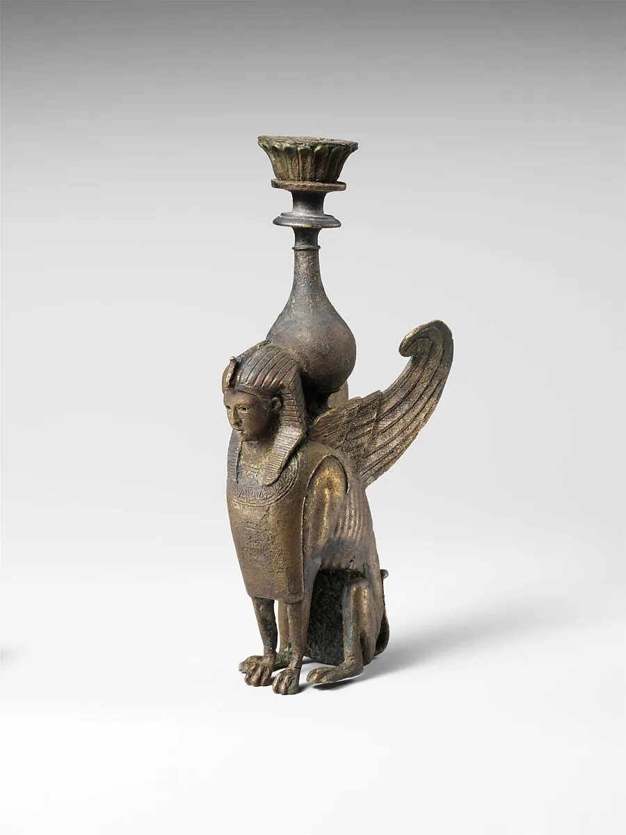 Bronze ornament in the form of a seated male sphinx — Unknown