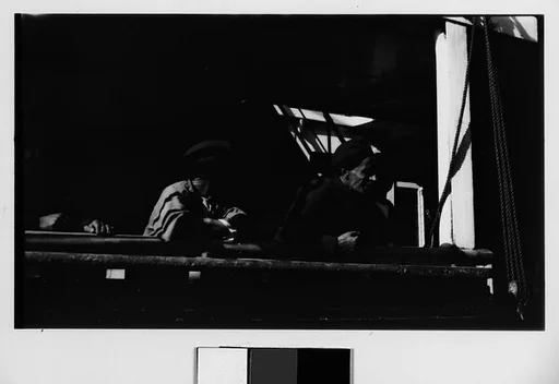 [Passengers on Deck of Docked Ship]