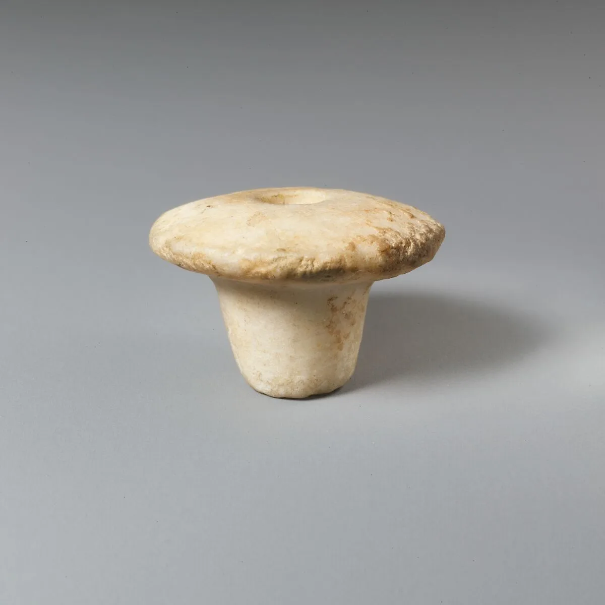Ivory spindle whorl — Unknown