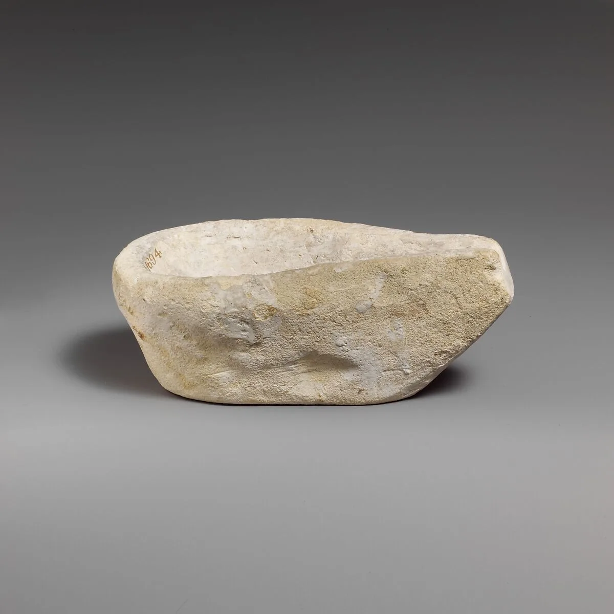 Limestone saucer lamp — Unknown