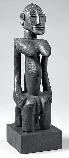 Seated Female Figure — Unknown