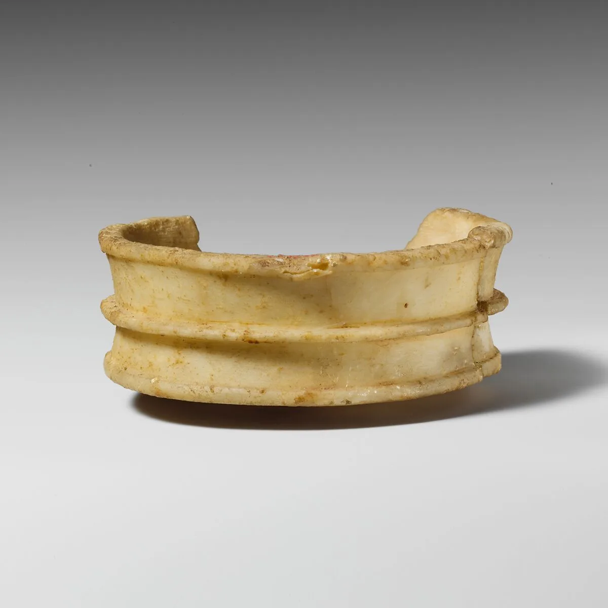 Fragmentary alabaster stemmed bowl — Unknown