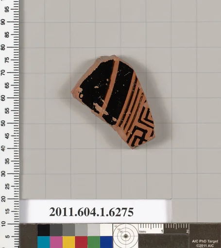 Terracotta fragment of a kylix (drinking cup)