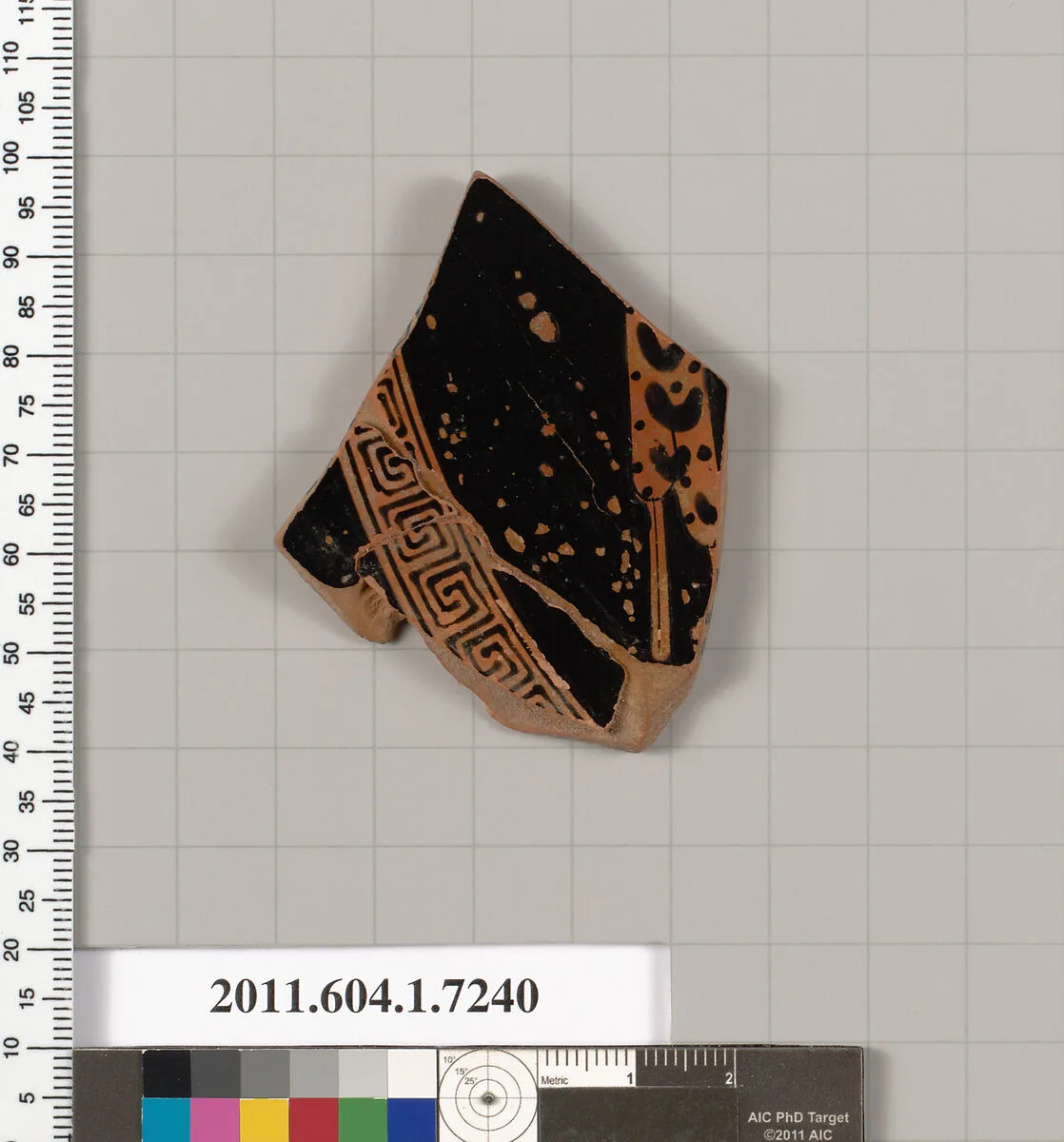 Terracotta fragment of a kylix (drinking cup) — Makron