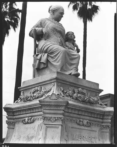 ["Margaret Statue" Monument of Woman Seated in Chair with Putto, New Orleans, Louisiana]