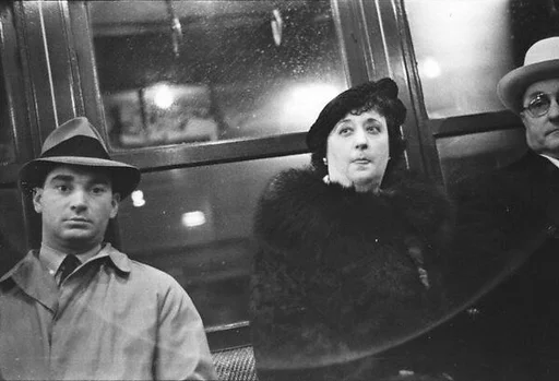 [Three 35mm Film Frames: Subway Passengers, New York City: Man and Couple, Man and Two Women]