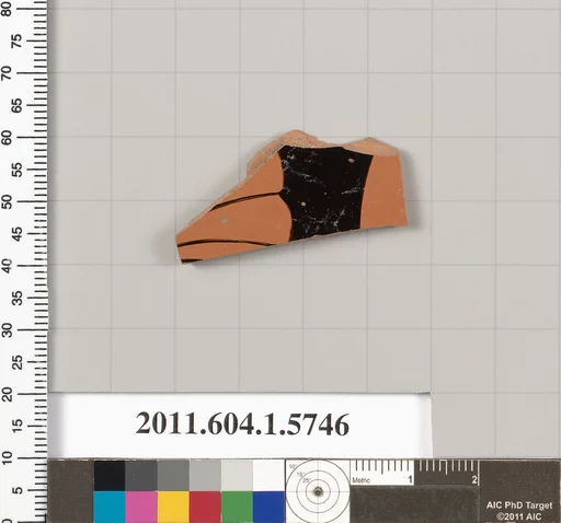 Terracotta fragment of a kylix: eye-cup (drinking cup)
