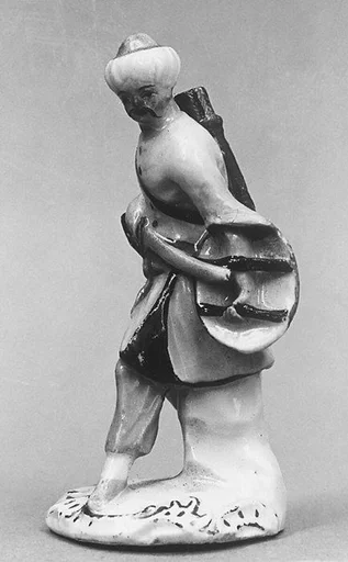 Figure of an Asian man