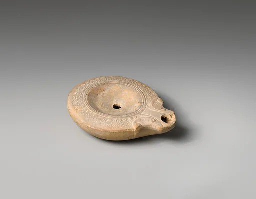 Terracotta oil lamp