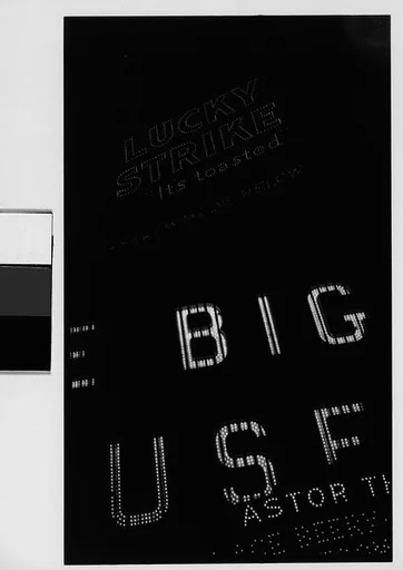 [Neon Signs at Night: "The Big House" and "Lucky Strike" Cigarettes, Times Square, New York City]