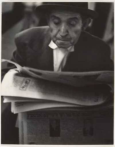 [Man Reading Yiddish Newspaper]