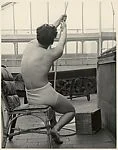 [Male Model Posed Pulling a Rope in Anna Huntington's Rooftop Studio]