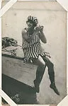 Bathing beauty with striped swimsuit and hat from Mack Sennett Comedies Arcade series (W423) — Unknown