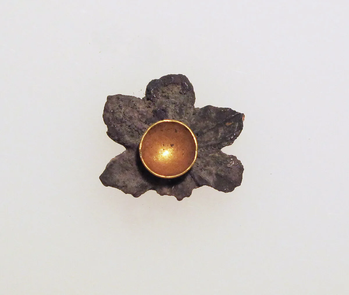 Bead in the form of a rosette — Unknown