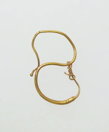 Earring, delta-shaped