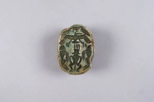 Scarab with Bes and prisoners