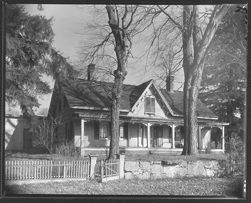 [Gothic Revival House with Bracketwork in Gable]