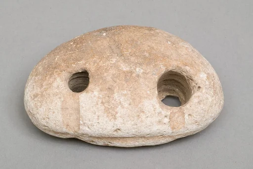 Weighing down device (fish net sinker?)
