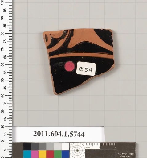 Terracotta fragment of a kylix: eye-cup (drinking cup)