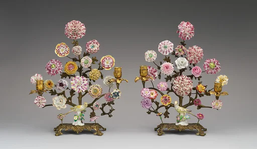 Pair of candelabra with porcelain flowers