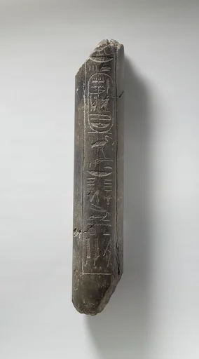 Fragment of a Statue of Haremhab bearing a standard