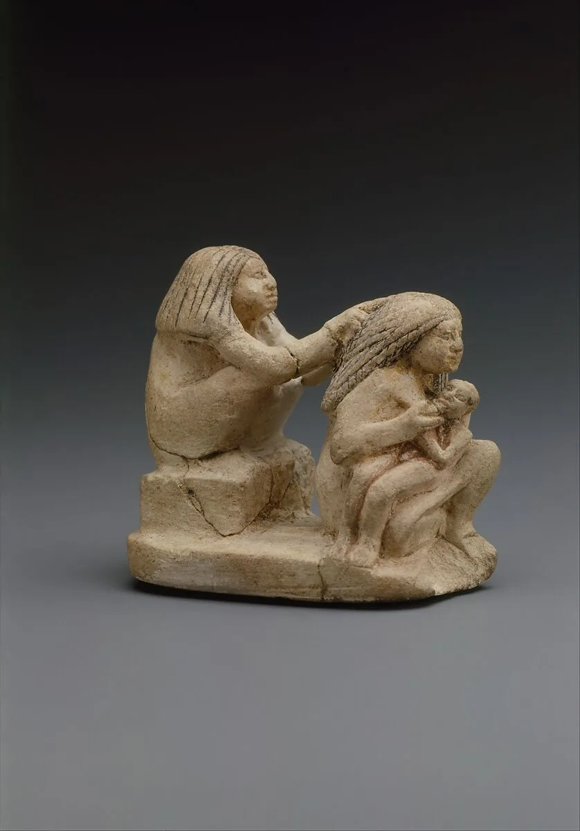 Group of two women and a child — Unknown