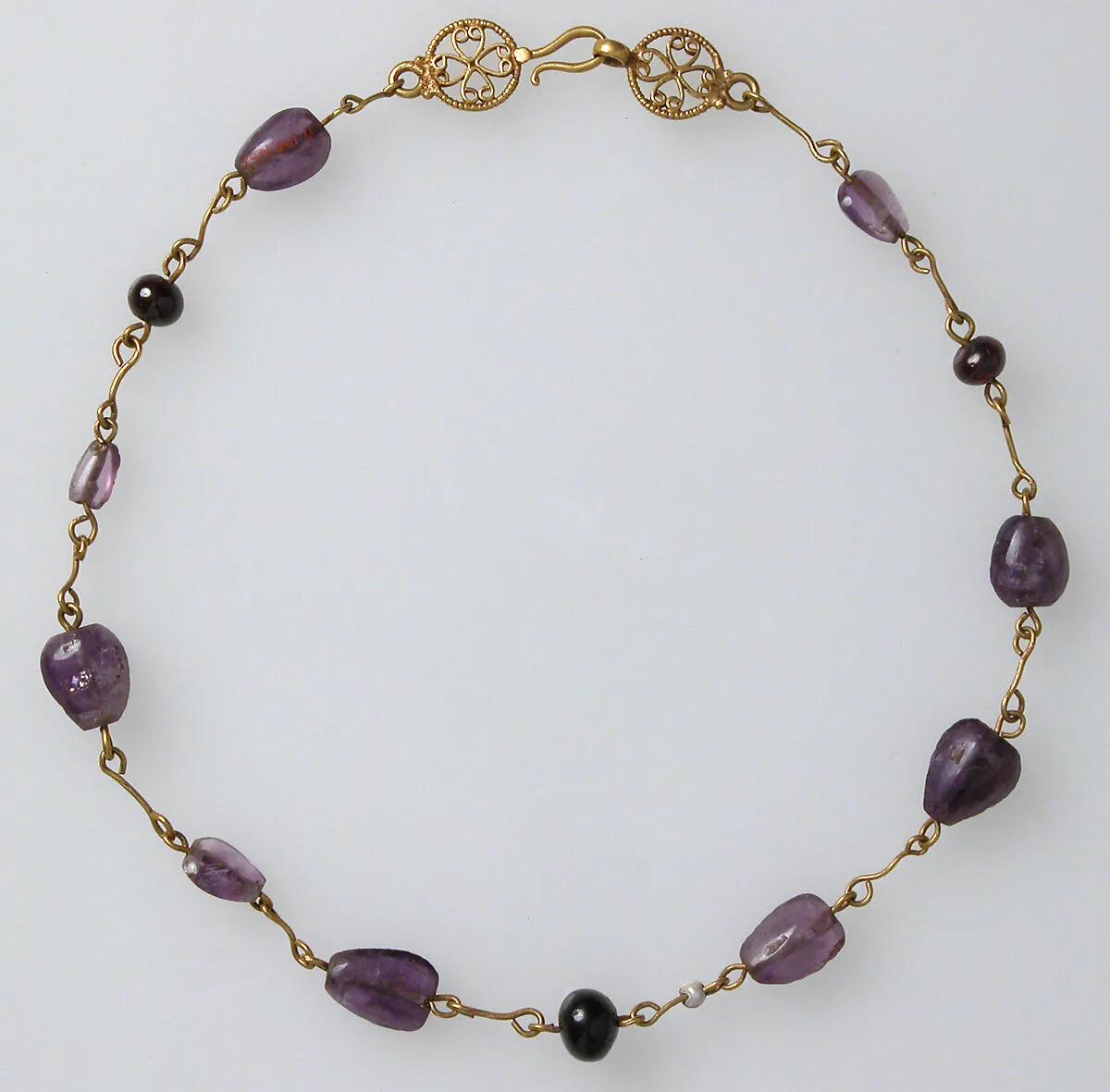 Gold Necklace with Amethysts, Glass Beads, and a Pearl — Unknown