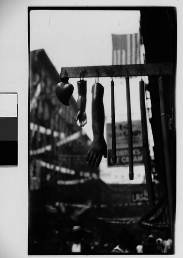 [Hanging Wax Votive Candle Display, Roosevelt Street, New York City]