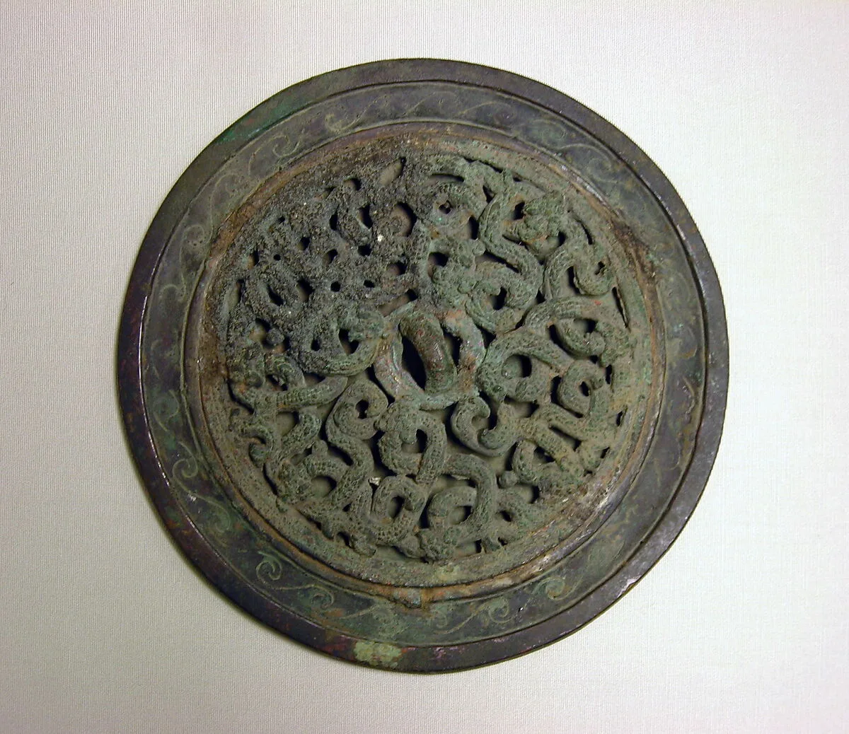 戰國 蟠螭紋銅鏡|Mirror with interlaced dragons — Unknown