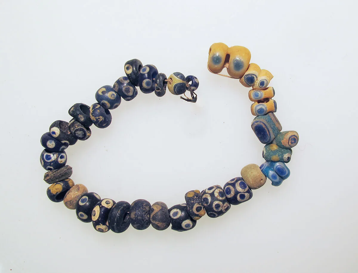 Glass eye beads — Unknown