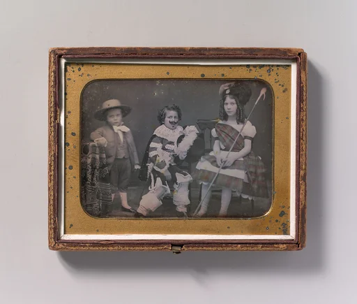 [Three Children in Costume]