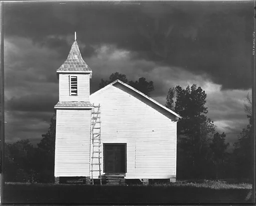 [Wooden Church with Adjacent Belltower and Ladder]